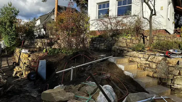 Hangbefestigung Hangsicherung Trockenmauer Sandstein Treppenanlage Blockstufen Falkensee